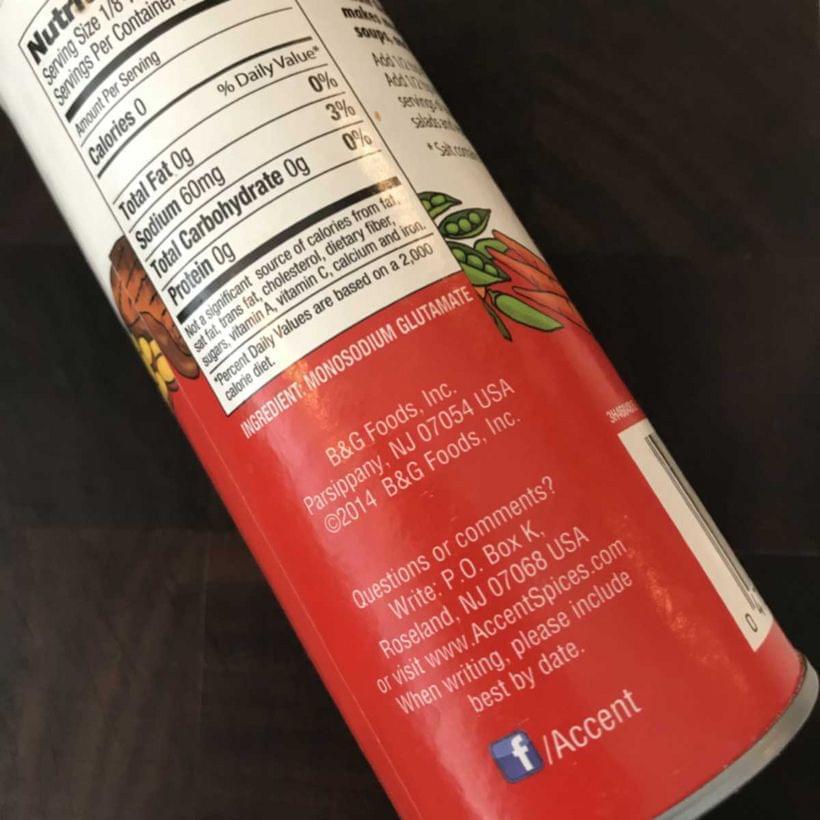 The side of a shaker of “Accent” seasoning. The only ingredient—monosodium glutimate—is centered.